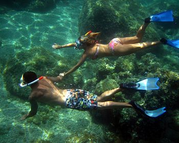 Escursione in barca di mezza giornata con snorkeling nell'Area Marina Protetta di Tavolara da Olbia