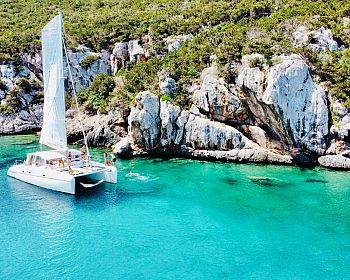 Escursione di un giorno intero in catamarano nel Parco di Porto Conte ad Alghero