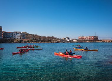 Guided kayak excursion from Scogliolungo Beach in Porto Torres