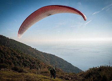 Paragliding over the Cinque Terre from Monterosso